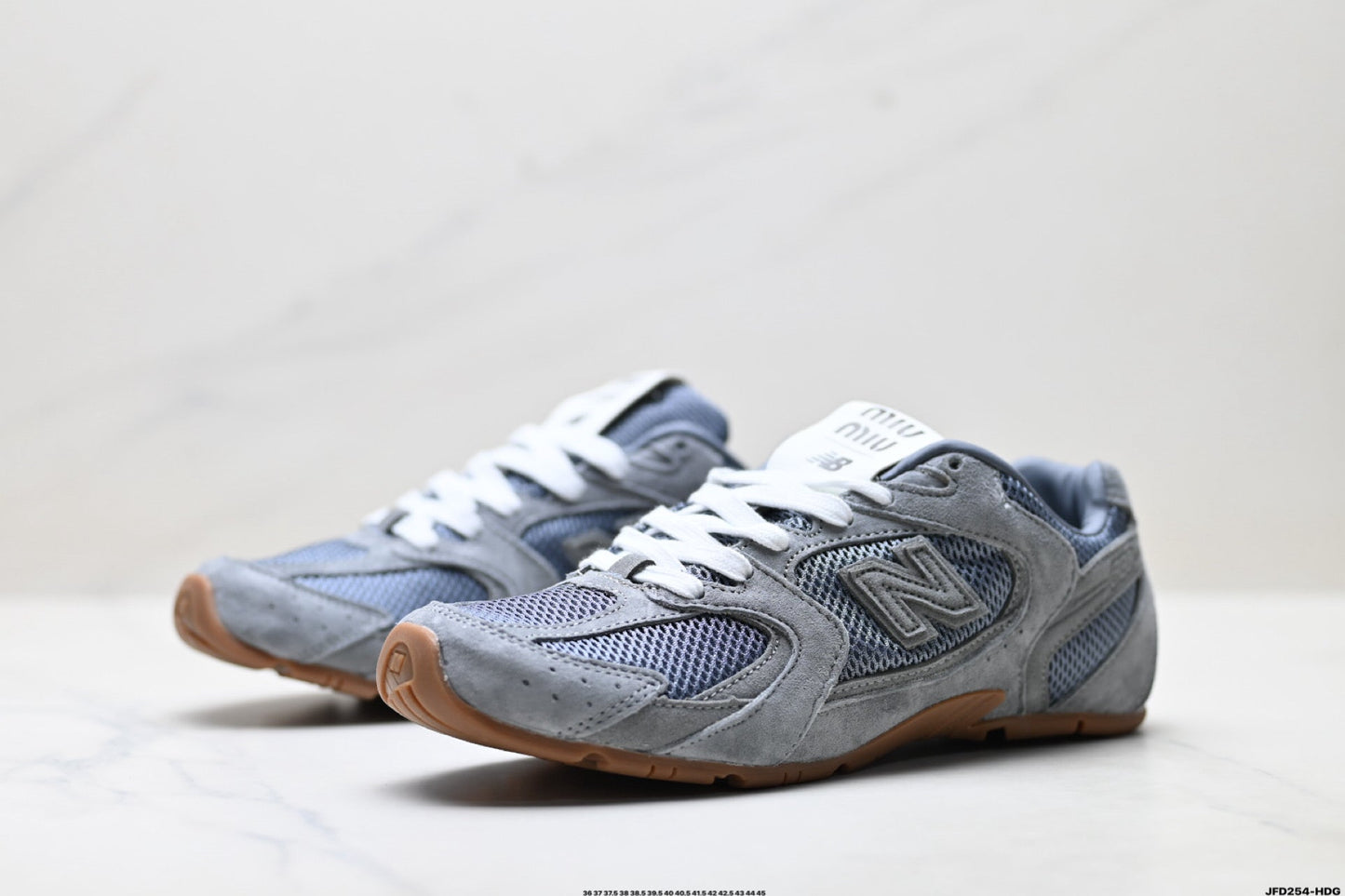 Miu Miu x New Balance 530 SL Retro Sneakers – Grey Gum