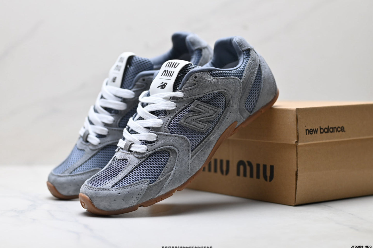Miu Miu x New Balance 530 SL Retro Sneakers – Grey Gum