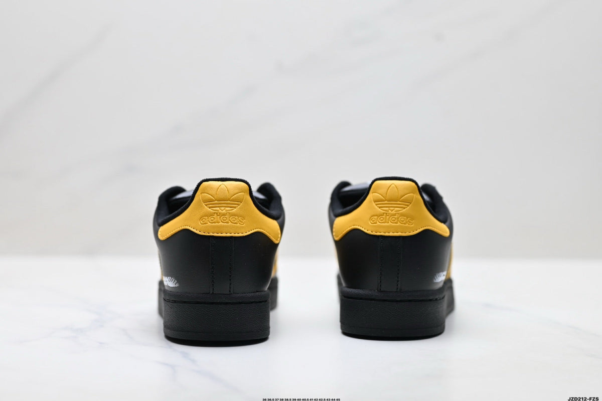 Adidas K81801450 Unisex Shell-Toe Sneakers - Black/Yellow - image 8